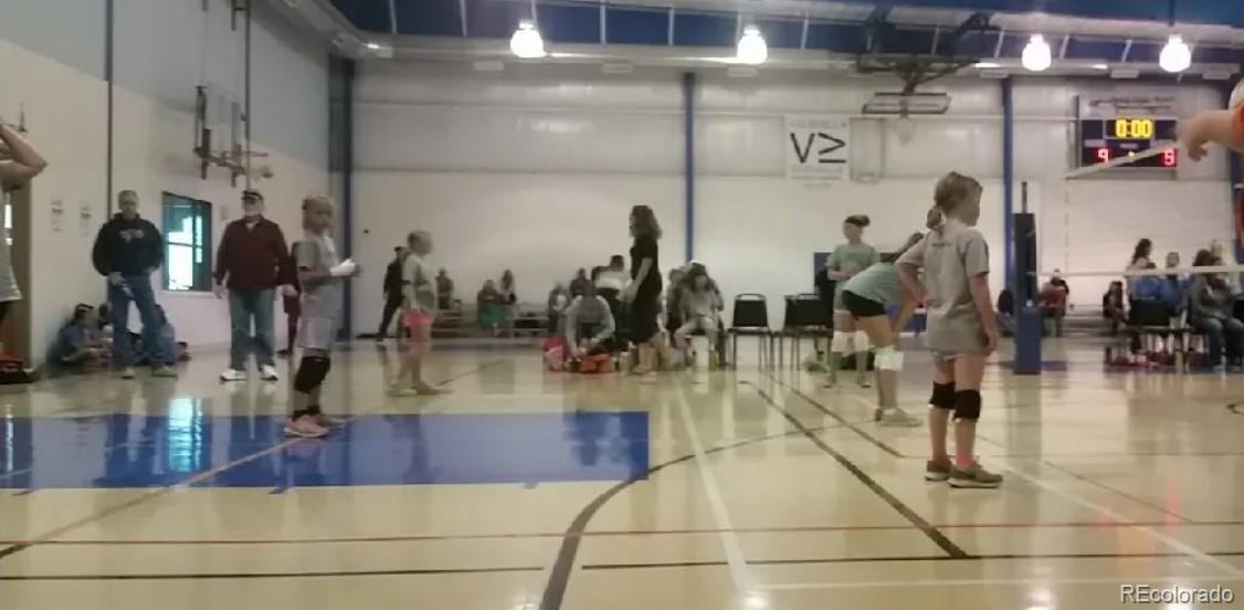 640 Aspen Avenue Bennett, CO 80102 - Photo 15 of 16 a view of a room with gym equipment