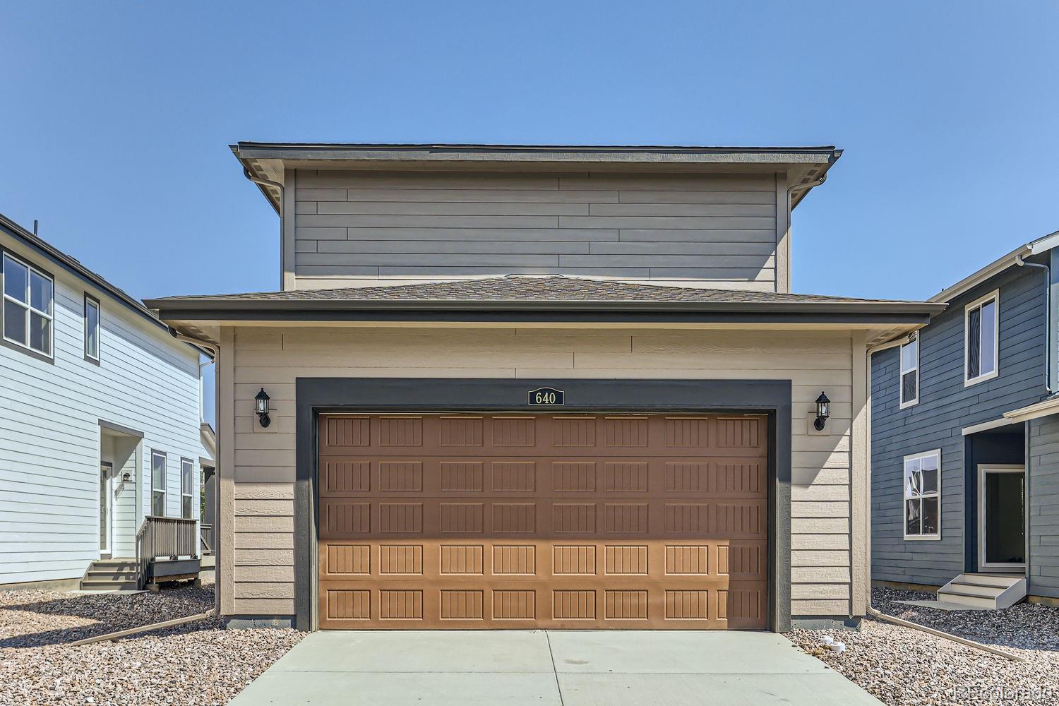 640 Aspen Avenue Bennett, CO 80102 - Photo 10 of 16 a front view of a house
