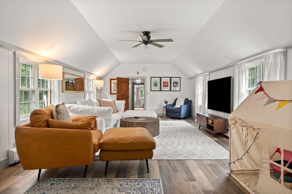 161 Spofford Road Boxford, MA 01921 - Photo 15 of 30 a living room with furniture and a flat screen tv