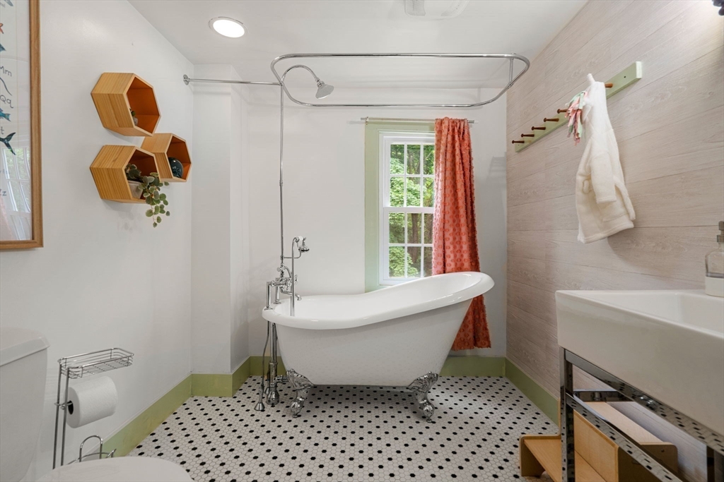 161 Spofford Road Boxford, MA 01921 - Photo 23 of 30 a bathroom with a bathtub and shower