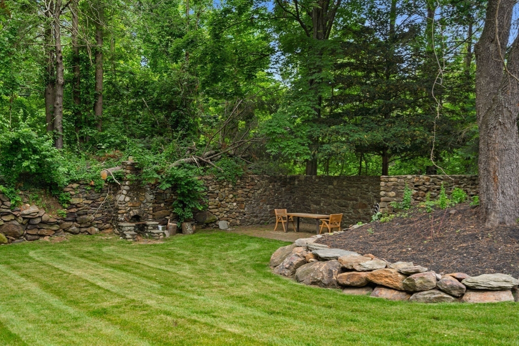 161 Spofford Road Boxford, MA 01921 - Photo 28 of 30 a backyard of a house with lots of green space