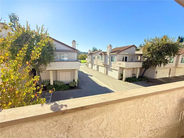 a view of a street with houses