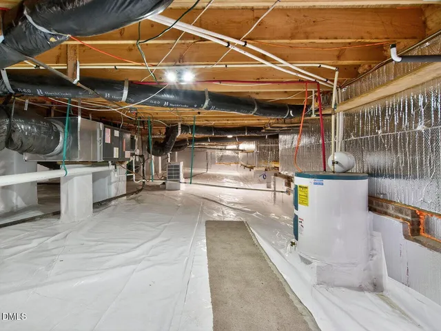 a front view of a house with outdoor seating