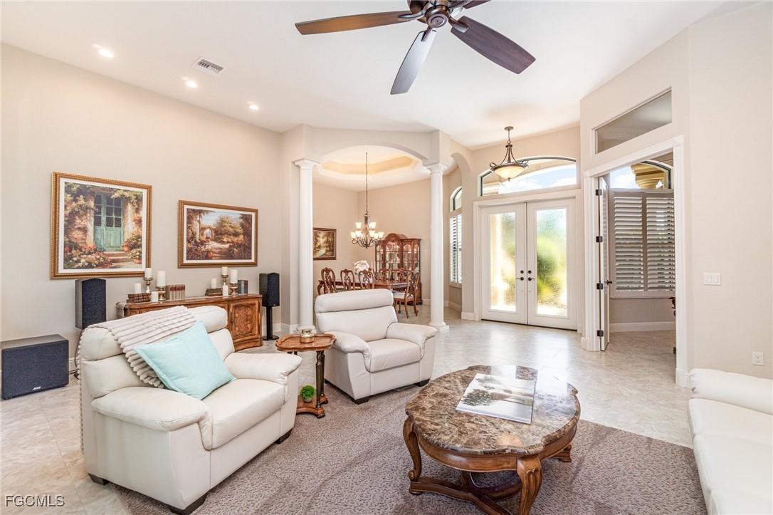 6135 Calusa Rdg Trail Bokeelia, FL 33922 - Photo 3 of 46 a living room with furniture and a large window