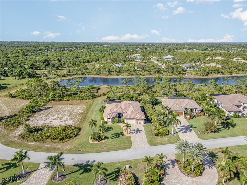 6135 Calusa Rdg Trail Bokeelia, FL 33922 - Photo 40 of 46 an aerial view of residential houses with outdoor space