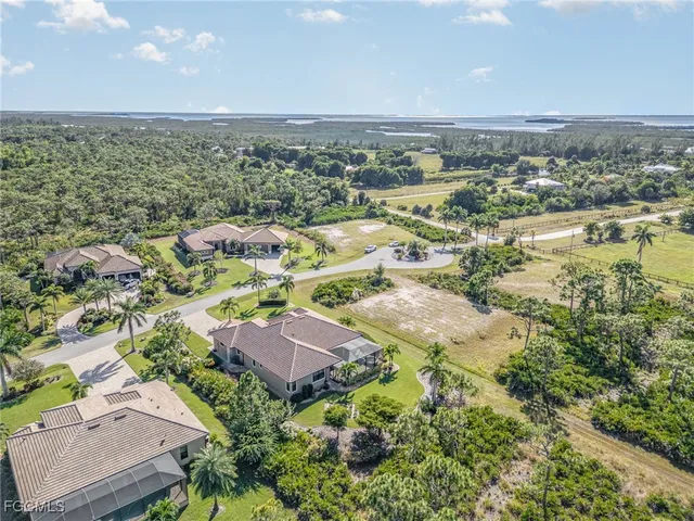 an aerial view of residential house with outdoor space