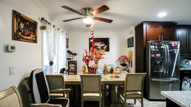 a view of a dining room with furniture