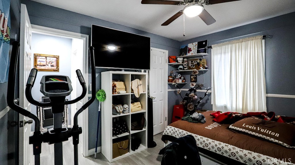 11821 Easy Way Garden Grove, CA 92840 - Photo 24 of 48 a living room with furniture and a flat screen tv