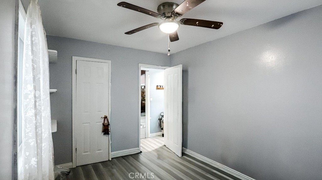 11821 Easy Way Garden Grove, CA 92840 - Photo 26 of 48 a view of a hallway with wooden floor