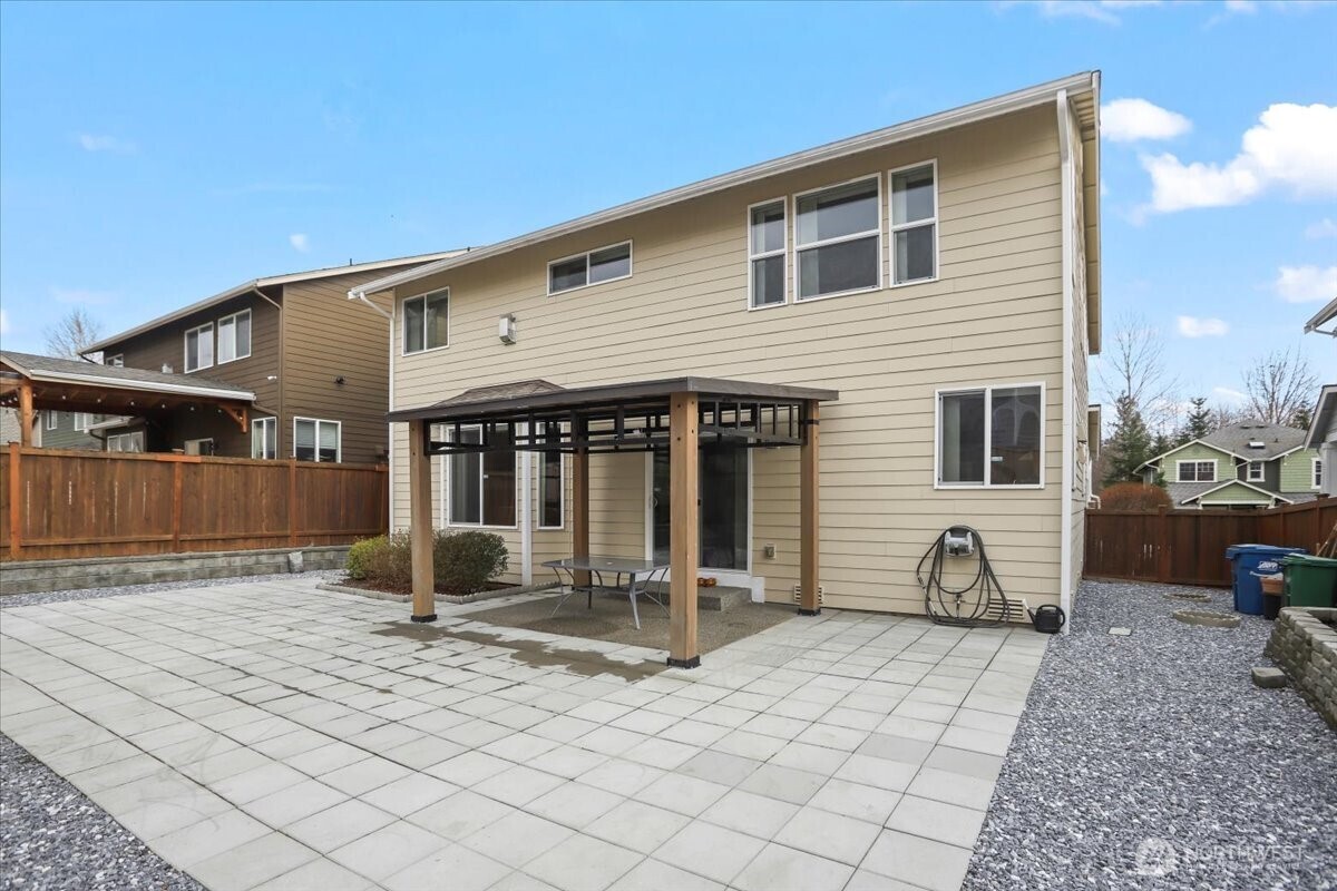 901 Jericho Place Northeast Renton, WA 98059 - Photo 33 of 38 a front view of a house with a patio