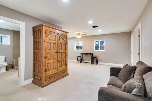 a view of livingroom with furniture and windows