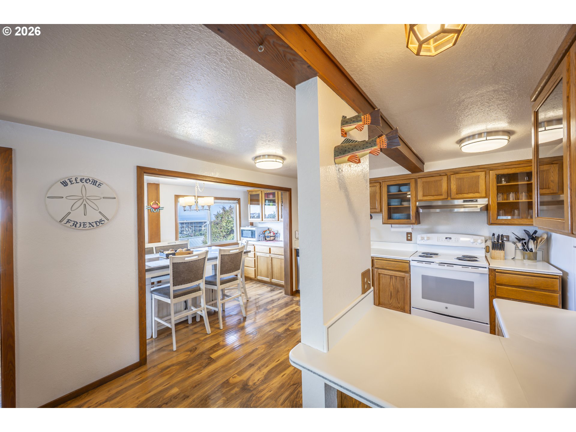 88426 2nd Avenue Florence, OR 97439 - Photo 11 of 45 a living room with stainless steel appliances granite countertop furniture and a kitchen view