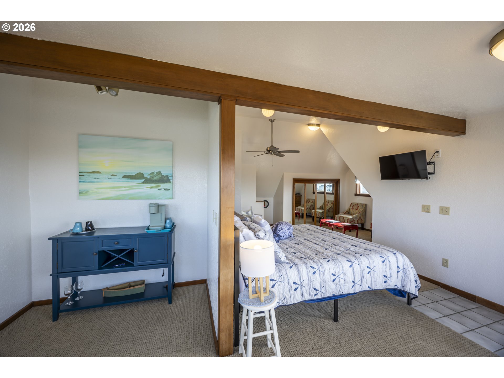 88426 2nd Avenue Florence, OR 97439 - Photo 18 of 45 a bedroom with a bed a desk and chair