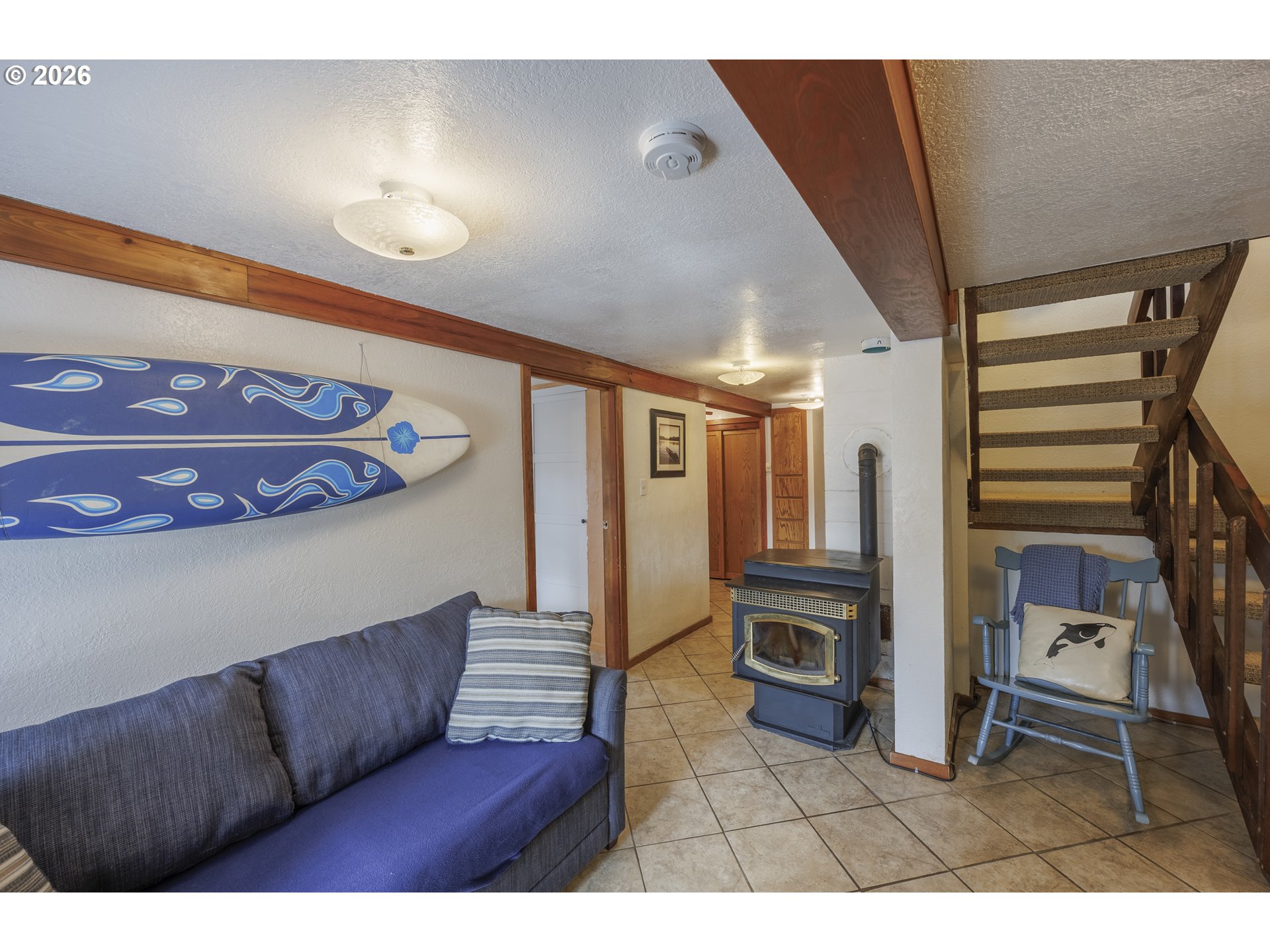 88426 2nd Avenue Florence, OR 97439 - Photo 22 of 45 a living room with furniture and a fireplace