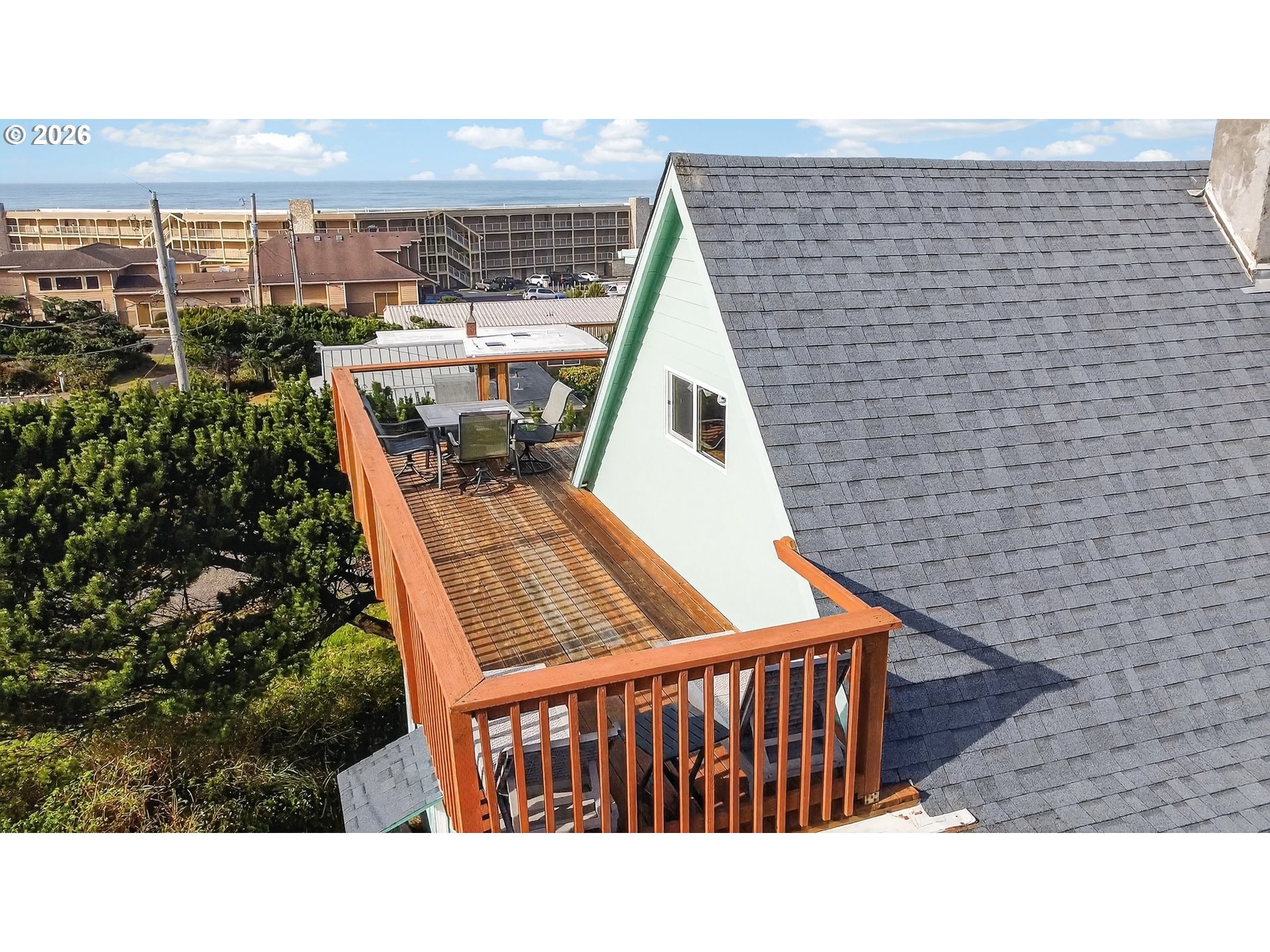 88426 2nd Avenue Florence, OR 97439 - Photo 45 of 45 a view of a balcony with wooden floor and city view