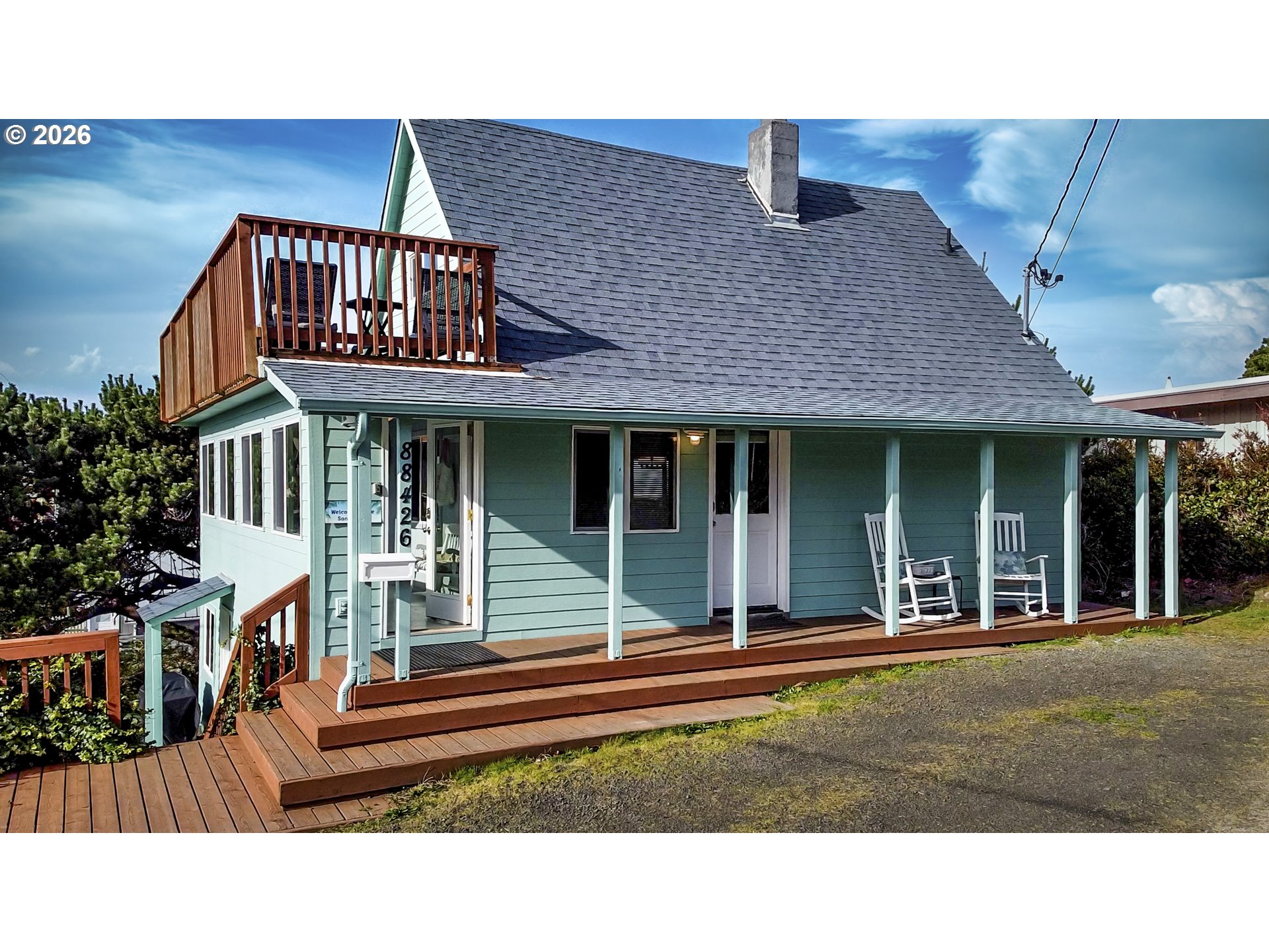 88426 2nd Avenue Florence, OR 97439 - Photo 5 of 45 a house view with a garden space
