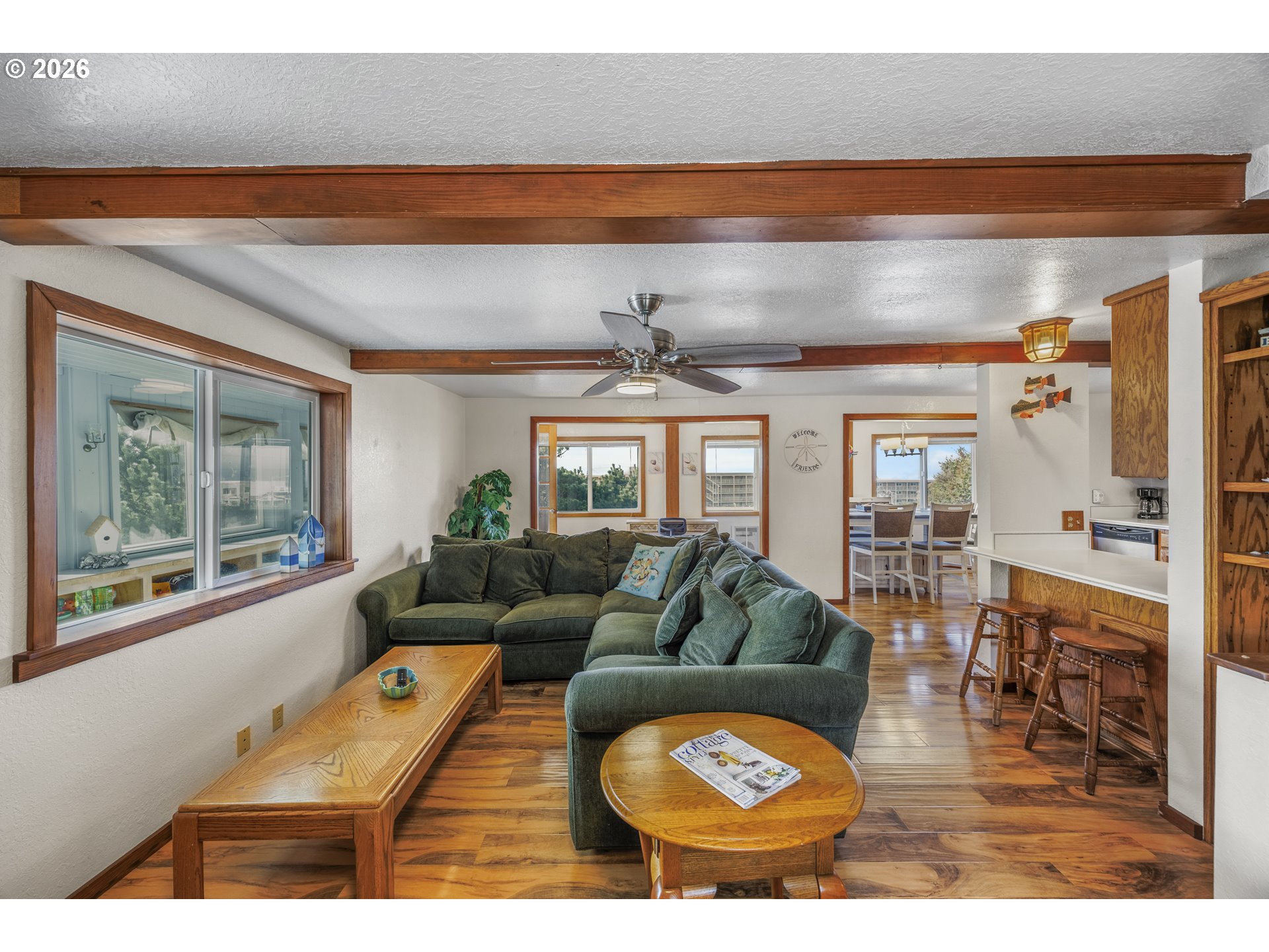 88426 2nd Avenue Florence, OR 97439 - Photo 8 of 45 a living room with furniture and a large window