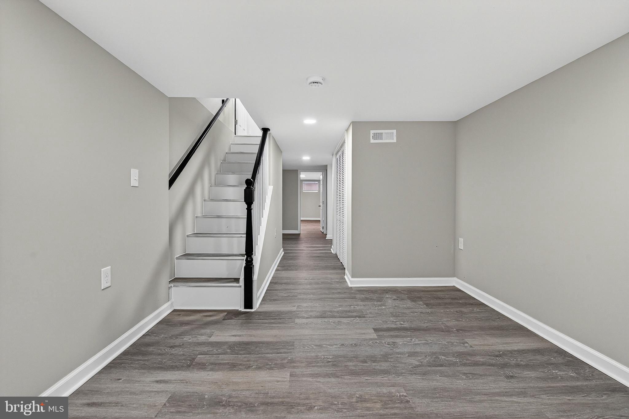 328 South Payson Street Baltimore, MD 21223 - Photo 12 of 27 a view of an entryway with wooden floor