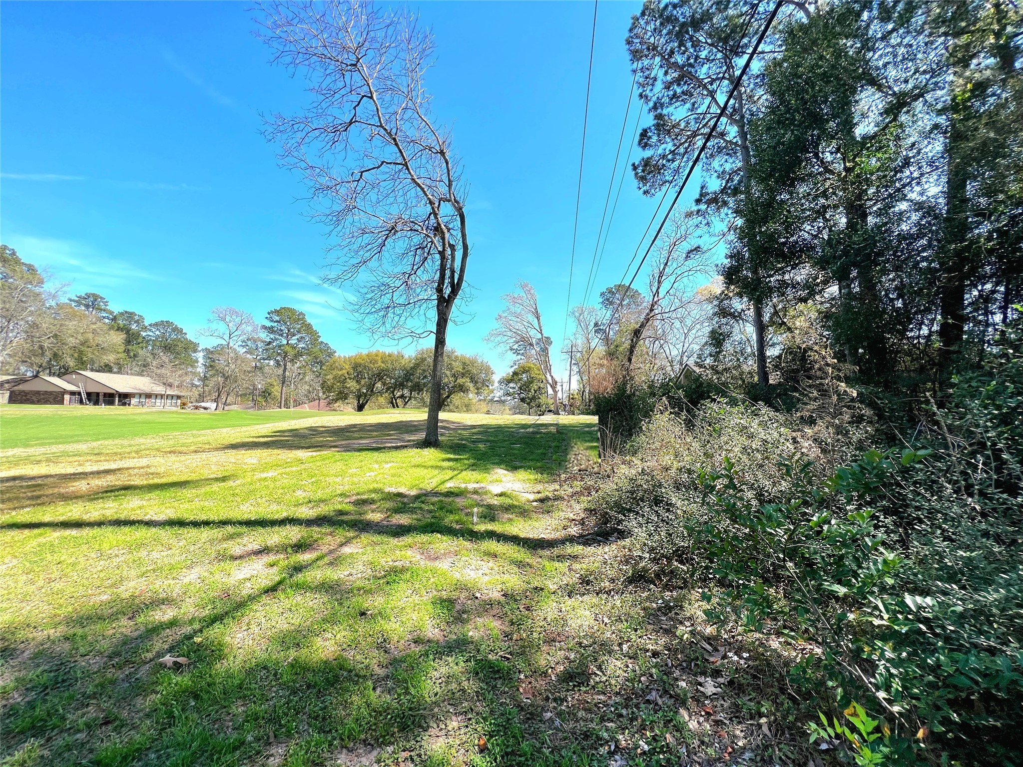 0 League Line Road Conroe, TX 77304 - Photo 4 of 11 a view of an outdoor space with a lake view