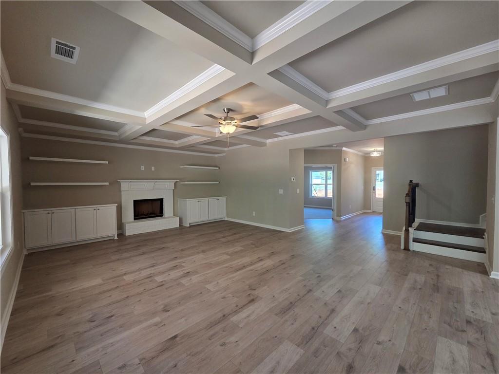 293 Meadows Drive Bethlehem, GA 30620 - Photo 13 of 34 a view of a hallway with wooden floor