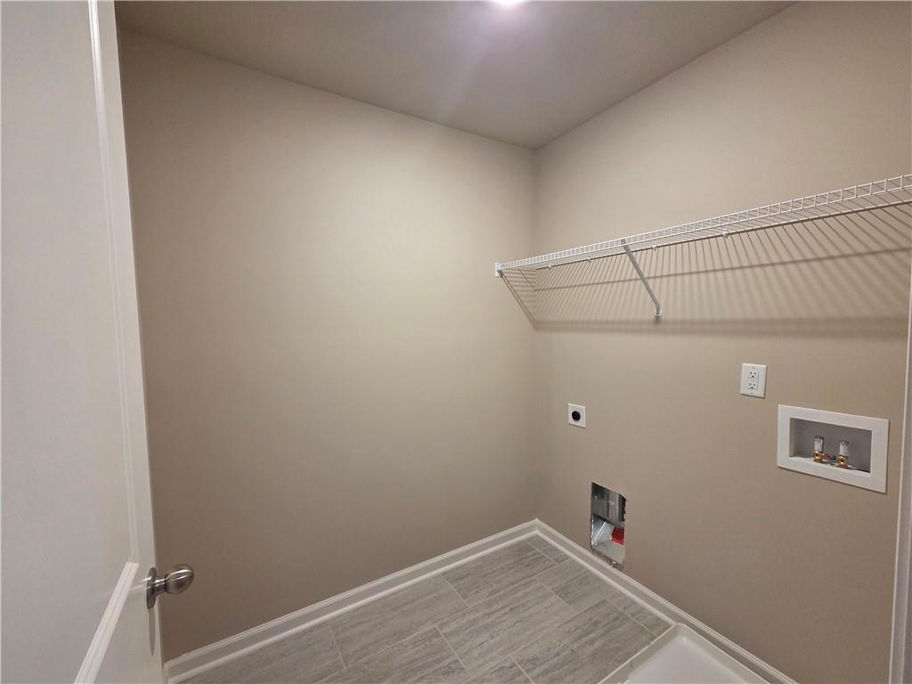 293 Meadows Drive Bethlehem, GA 30620 - Photo 21 of 34 a view of a room with racks on the wall