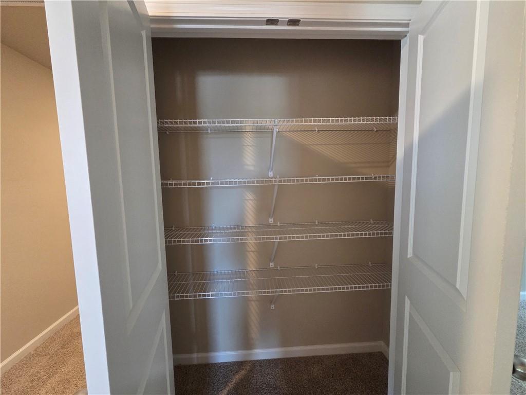 293 Meadows Drive Bethlehem, GA 30620 - Photo 25 of 34 a room with a wooden door