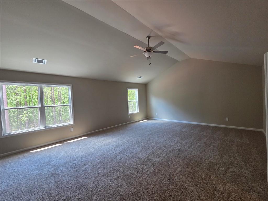 293 Meadows Drive Bethlehem, GA 30620 - Photo 28 of 34 an empty room with a empty space and windows