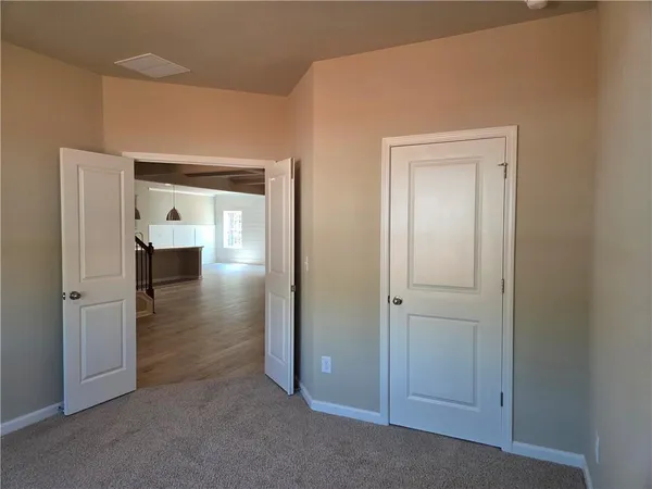 a bathroom with a toilet and a bath tub