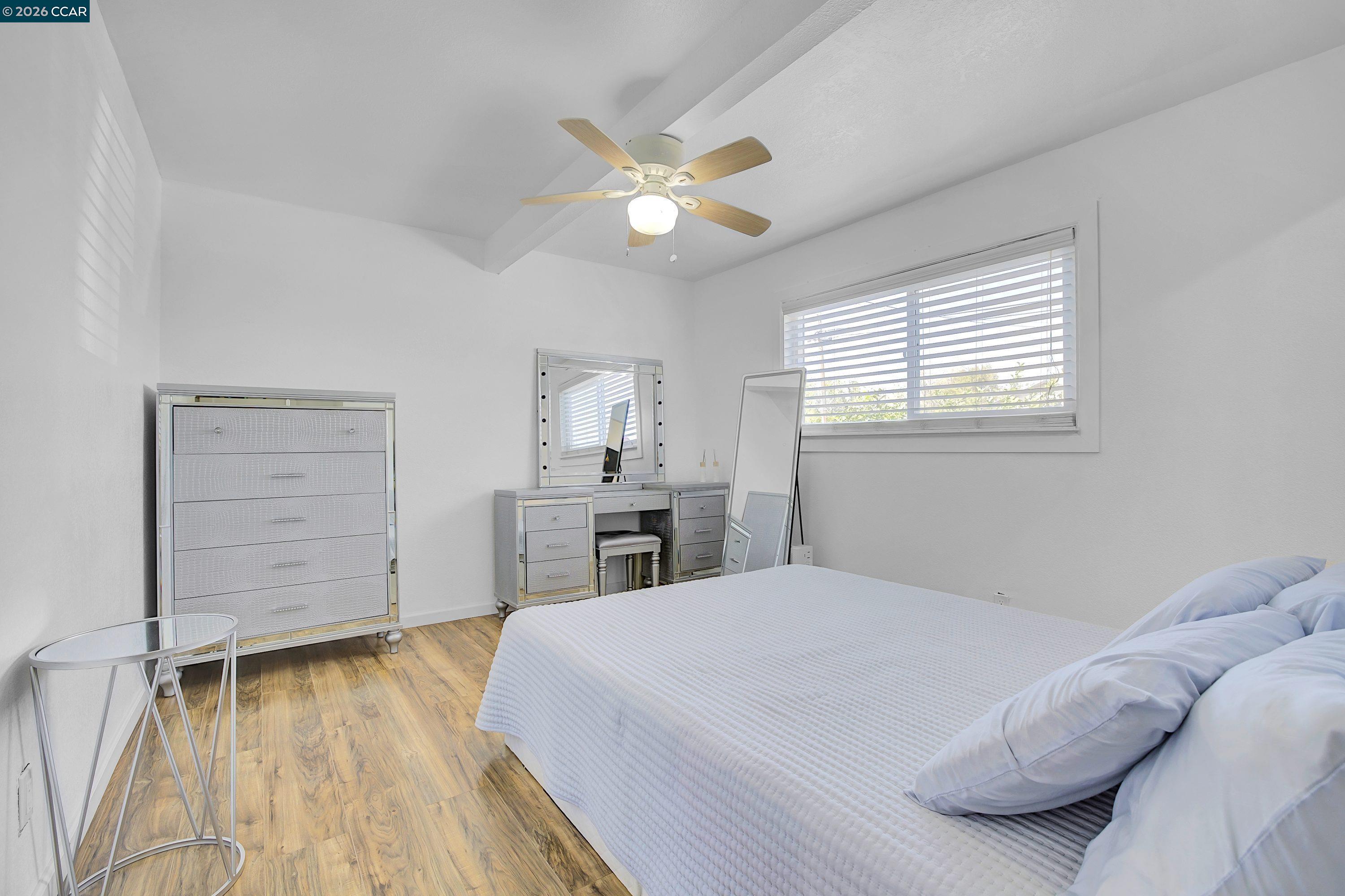 149 Shore Road Bay Point, CA 94565 - Photo 15 of 30 a bedroom with a bed and a dresser