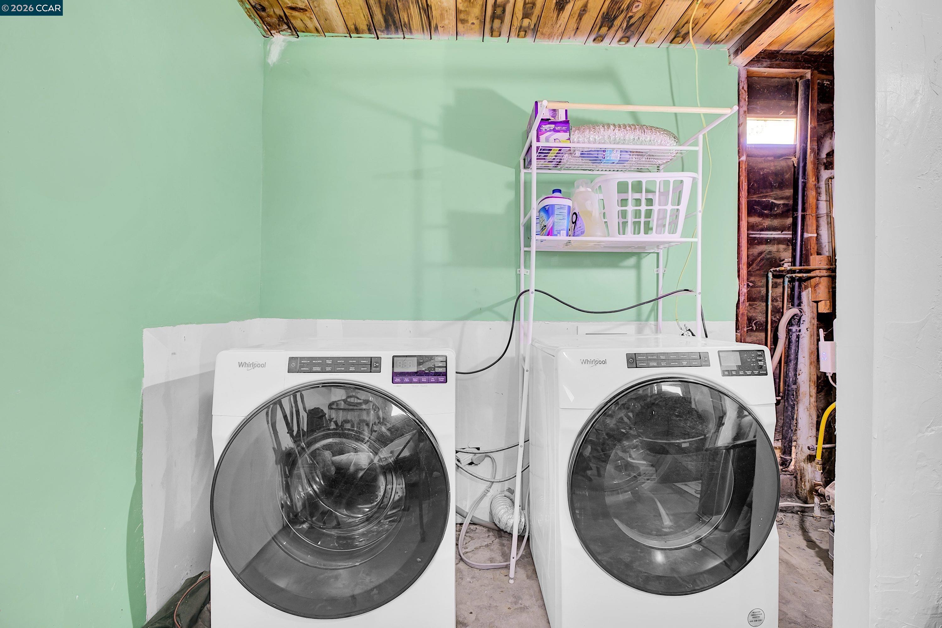 149 Shore Road Bay Point, CA 94565 - Photo 9 of 30 a utility room with dryer and washer