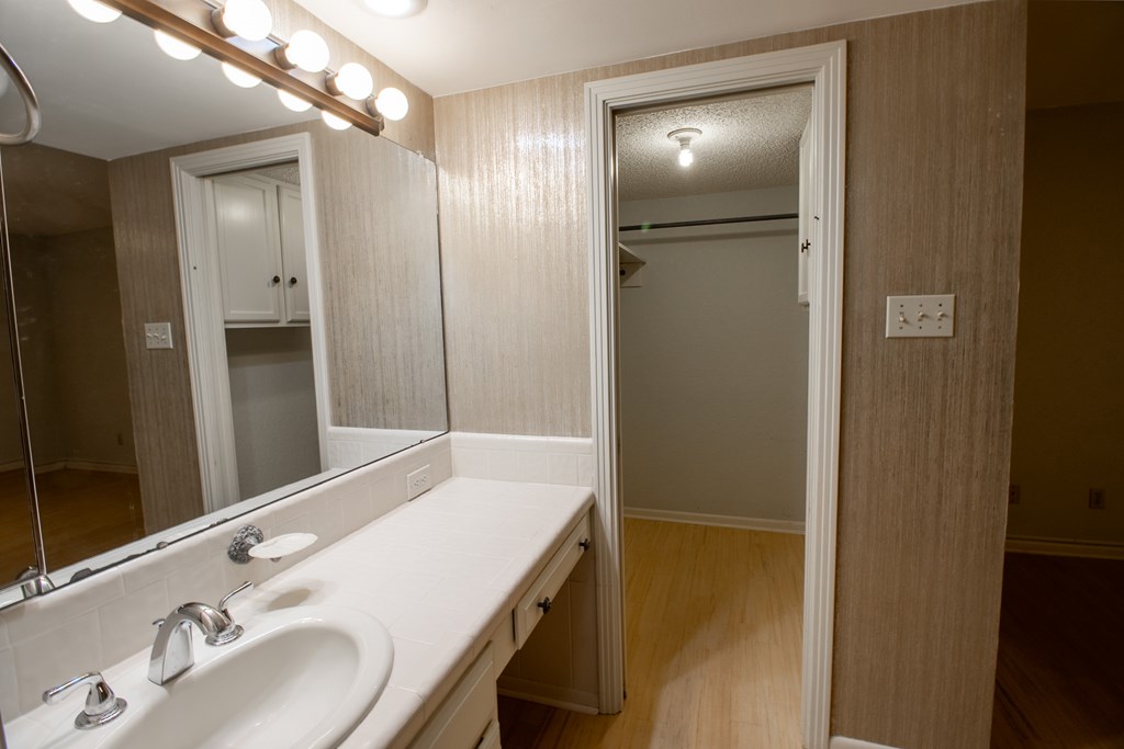 1127 Lois Street Kerrville, TX 78028 - Photo 15 of 23 a bathroom with a sink and a mirror