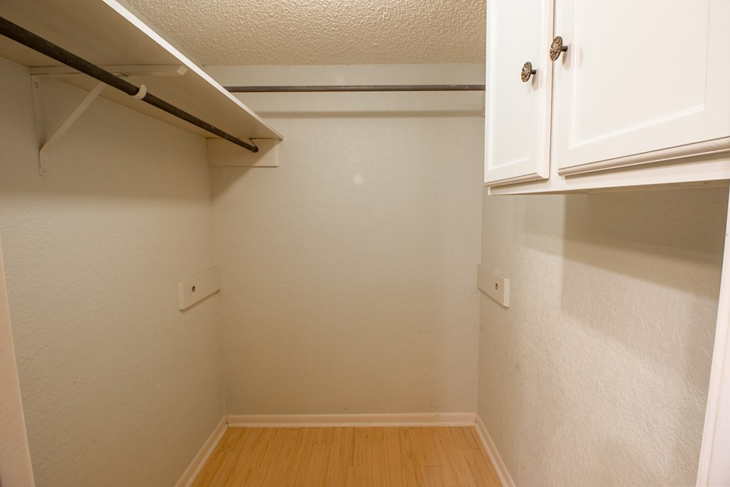 1127 Lois Street Kerrville, TX 78028 - Photo 16 of 23 a view of a room with racks on the wall