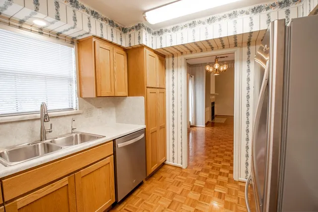a bathroom with a sink and a shower