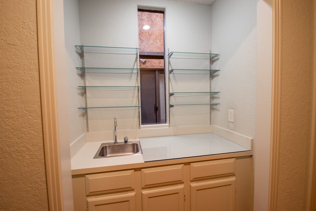 1127 Lois Street Kerrville, TX 78028 - Photo 10 of 23 a close view of a sink and tap