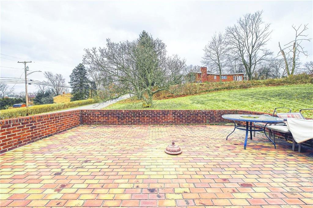 545 Fort Couch Road Pittsburgh, PA 15241 - Photo 6 of 21 Huge Patio Area right out side kitchen door above the oversized 2 car Garage.