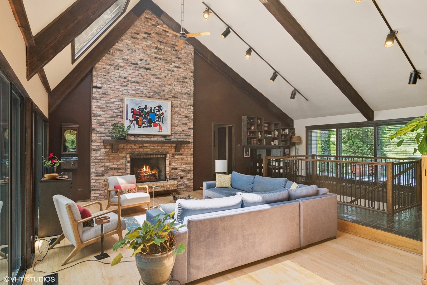 284 Oxford Road North Barrington, IL 60010 - Photo 17 of 48 a living room with fireplace furniture and a floor to ceiling window