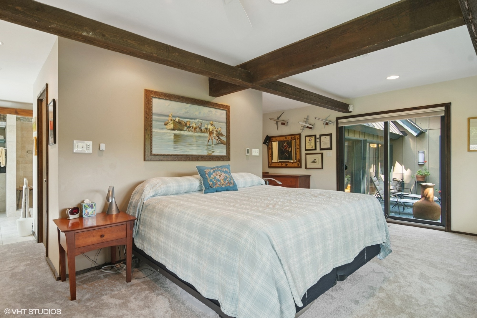 284 Oxford Road North Barrington, IL 60010 - Photo 18 of 48 a bedroom with a large bed and a chandelier