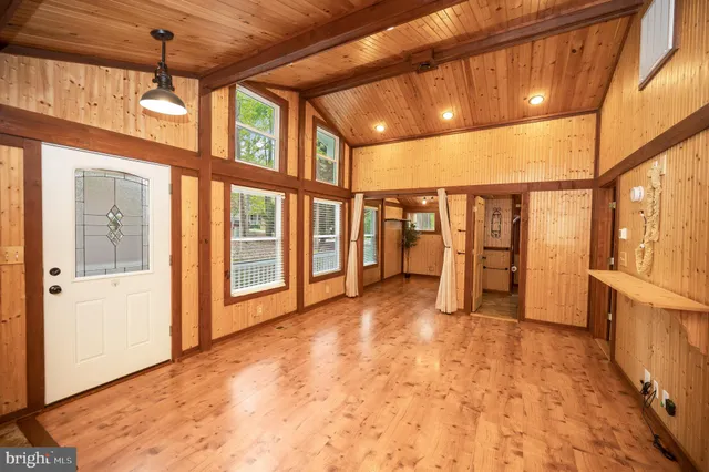 a kitchen with a sink a stove and cabinets