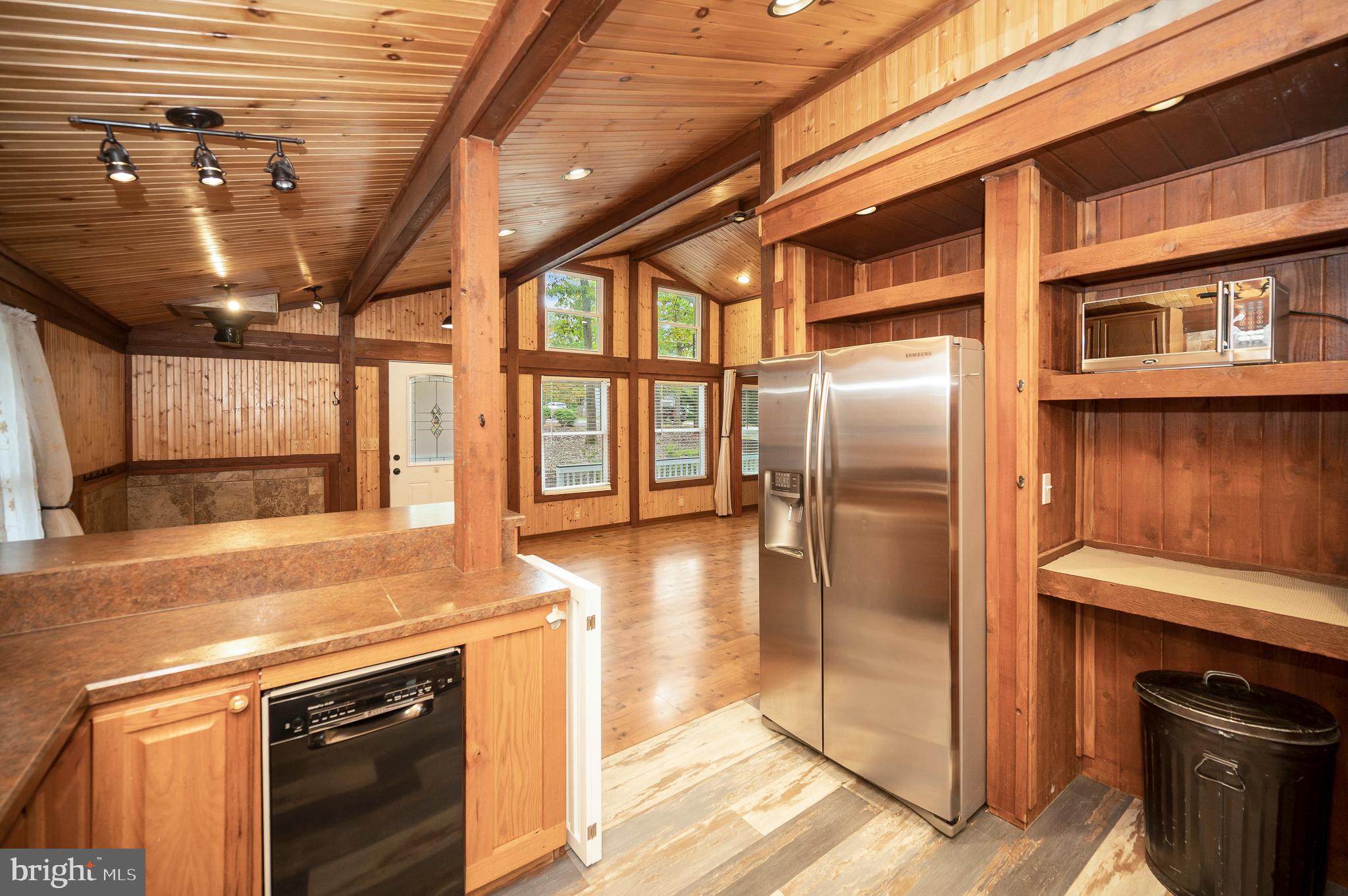 4239 Lakeview Parkway Locust Grove, VA 22508 - Photo 22 of 65 a kitchen with stainless steel appliances granite countertop a stove a refrigerator and a cabinets
