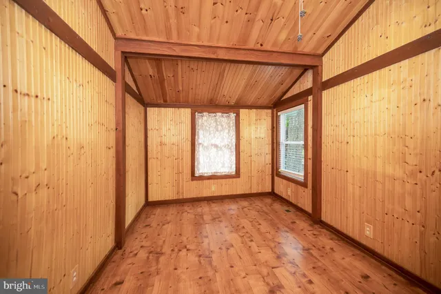 a view of a wooden roof deck