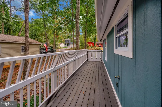 a view of a lake with outdoor seating space
