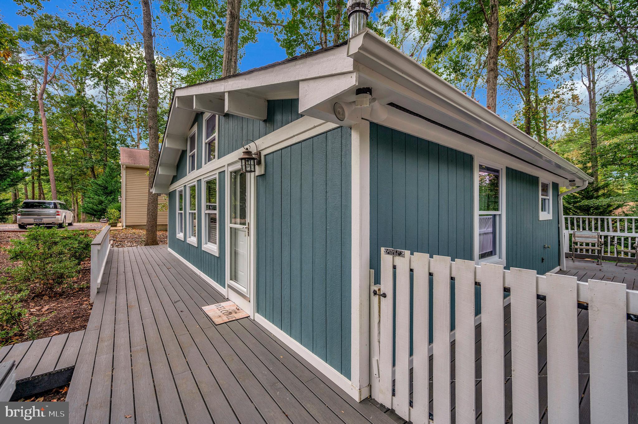 4239 Lakeview Parkway Locust Grove, VA 22508 - Photo 7 of 65 a view of wooden house with a deck