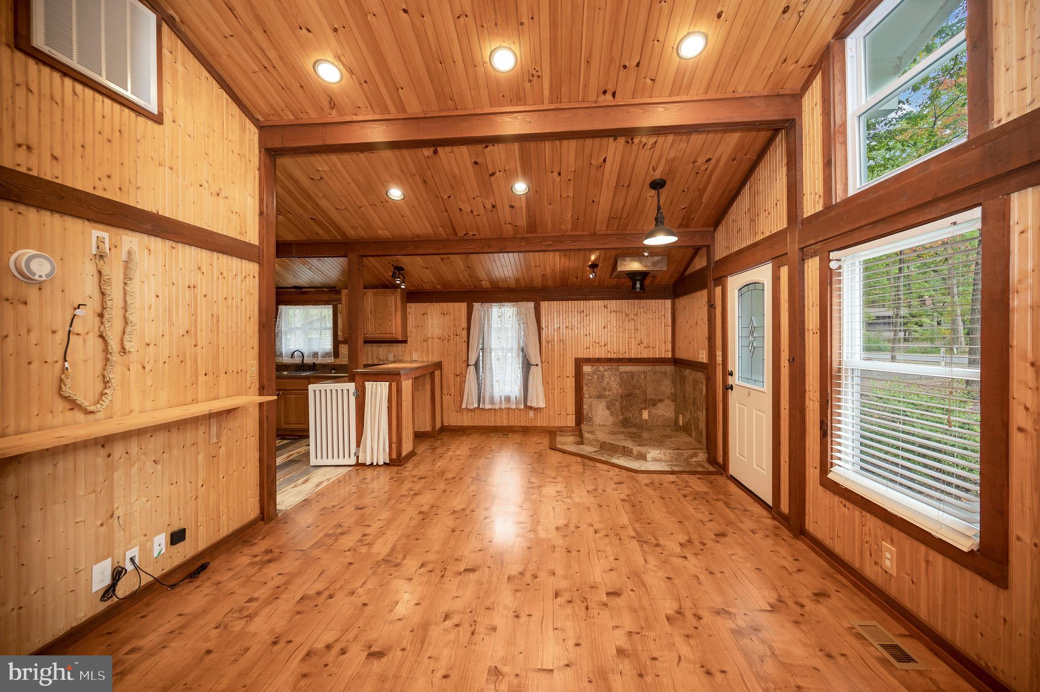 4239 Lakeview Parkway Locust Grove, VA 22508 - Photo 10 of 65 a view of an empty room with wooden floor