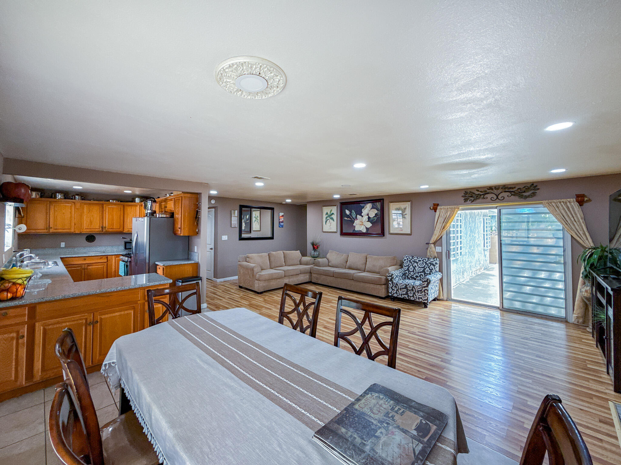 45431 Sancroft Avenue Lancaster, CA 93535 - Photo 17 of 49 a very nice looking living room with a large window
