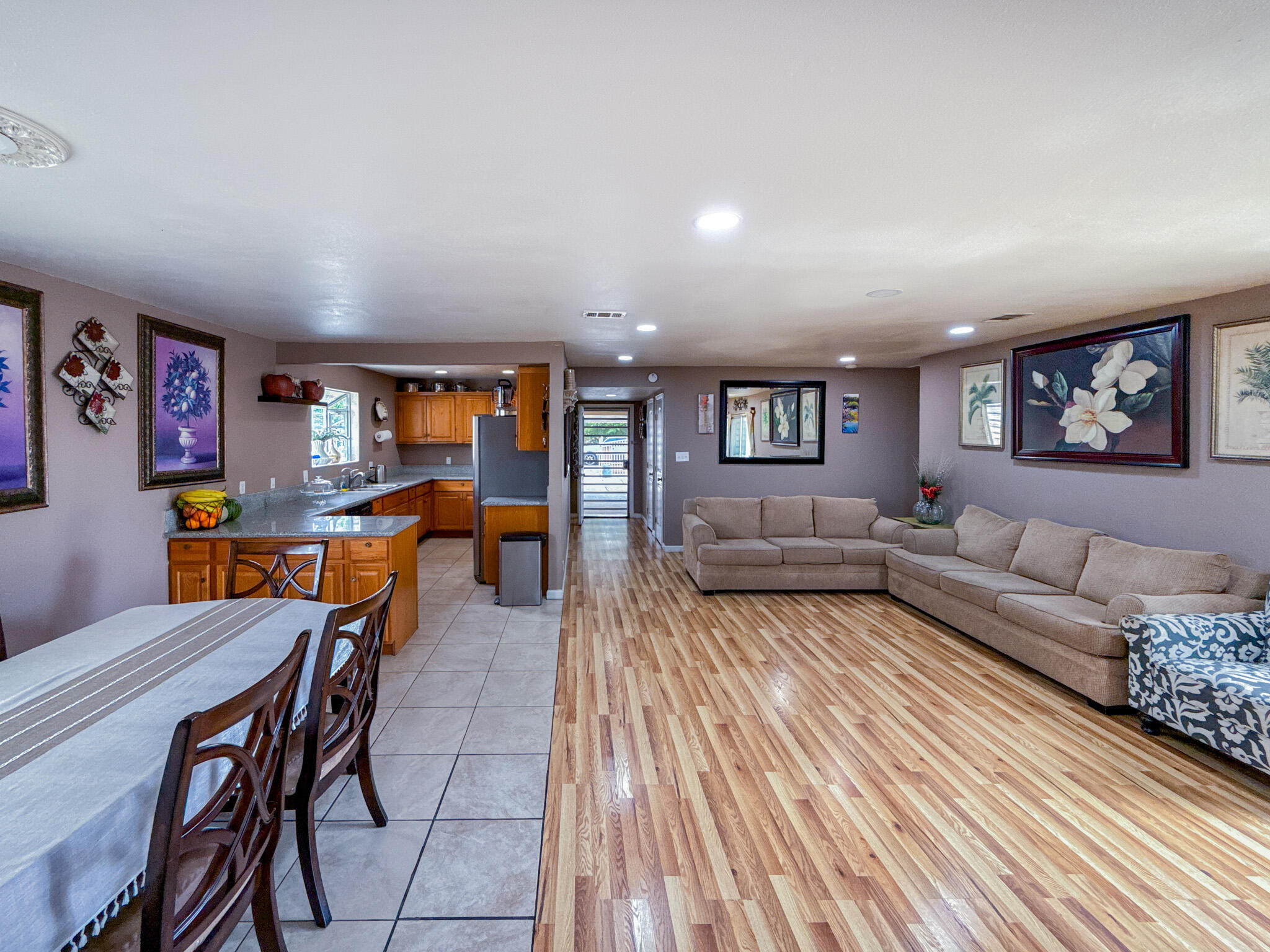 45431 Sancroft Avenue Lancaster, CA 93535 - Photo 25 of 49 a living room with furniture and a couch
