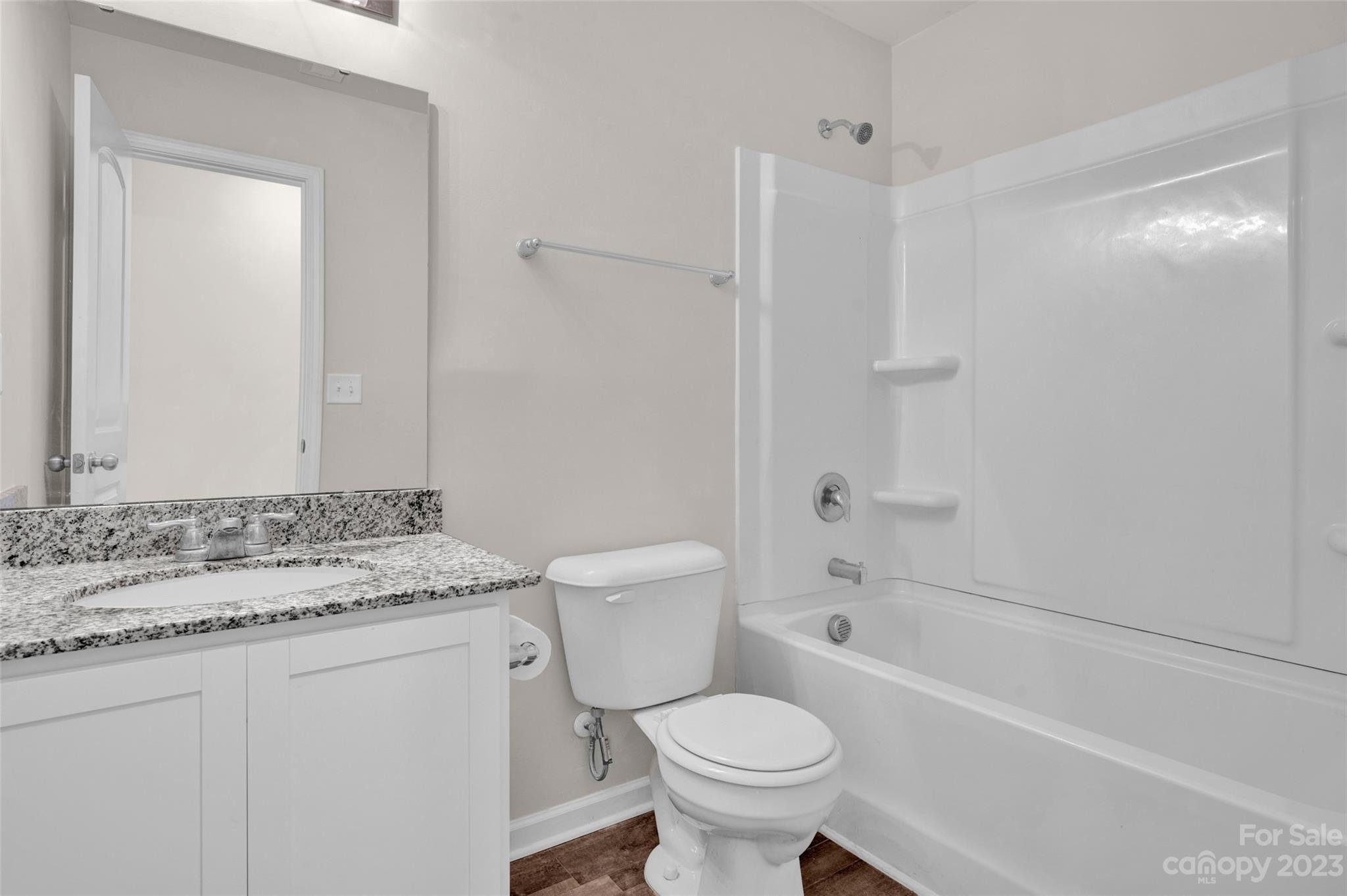 1476 Mulberry Ridge Drive Newton, NC 28658 - Photo 28 of 34 a bathroom with a sink toilet vanity and shower