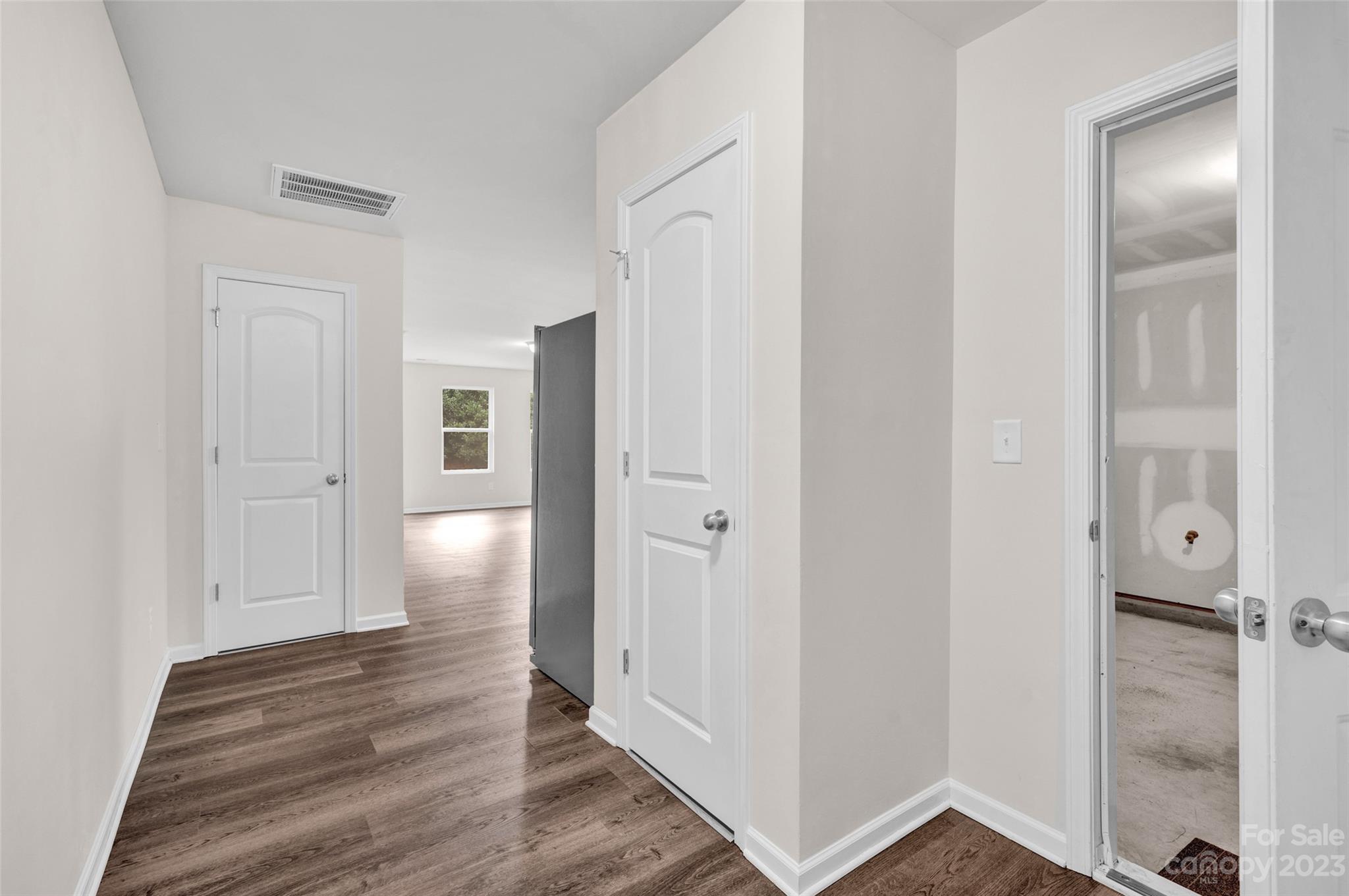 1476 Mulberry Ridge Drive Newton, NC 28658 - Photo 8 of 34 a view of a hallway with wooden floor