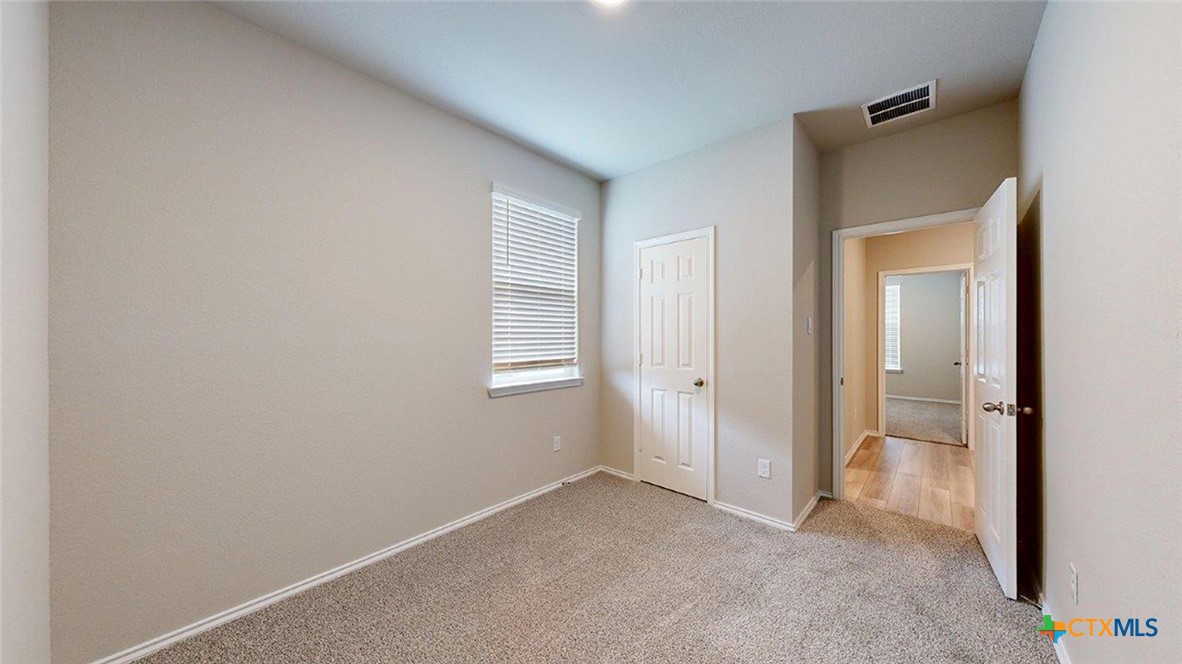 1111 Stone Vly Road Temple, TX 76502 - Photo 14 of 21 a view of an empty room with a window