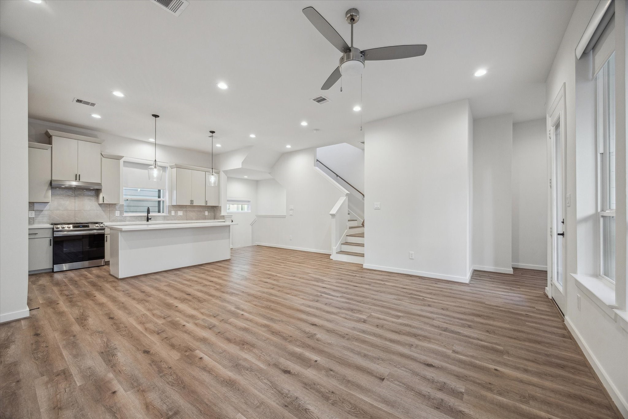 1603 Patterson Street, Unit E Houston, TX 77007 - Photo 19 of 32 a view of kitchen with cabinets and stainless steel appliances