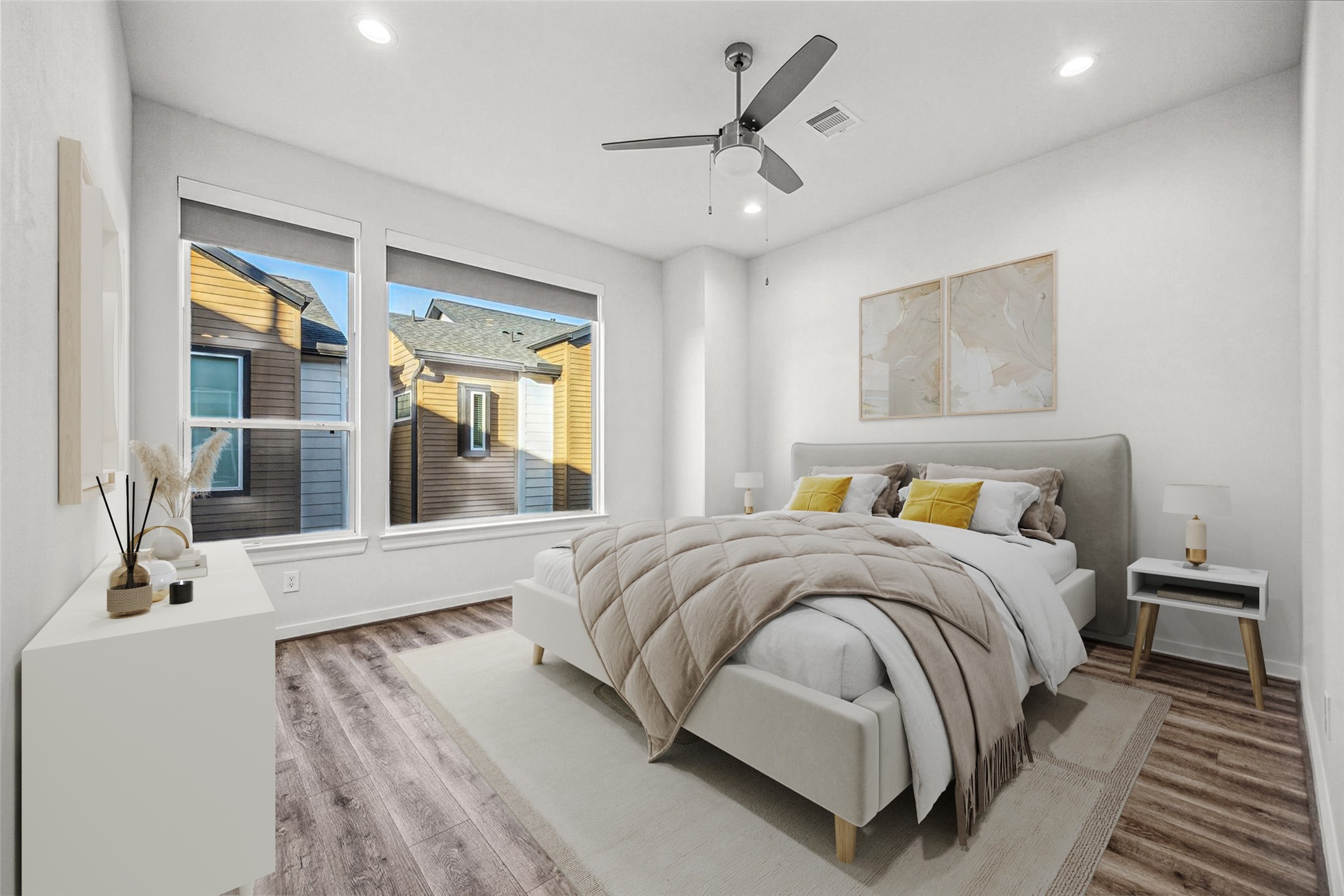 1603 Patterson Street, Unit E Houston, TX 77007 - Photo 26 of 32 a bedroom with a large bed and a chandelier